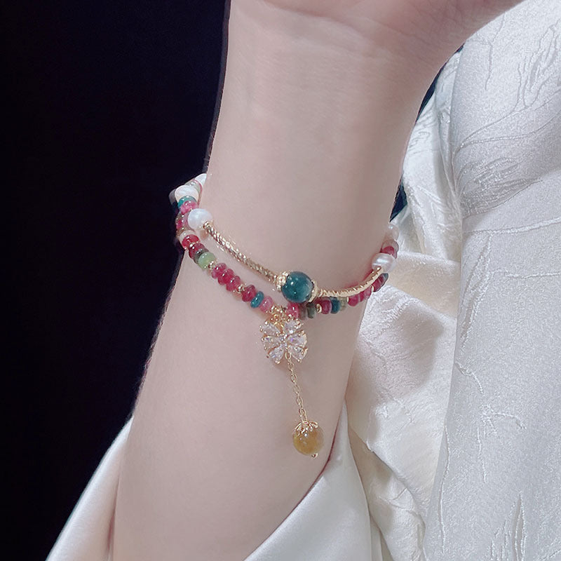 Colorful Wheel Stone Bracelet with Flower Design