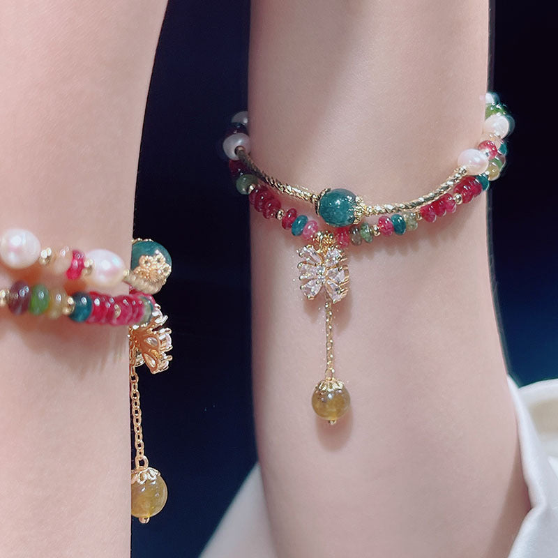 Colorful Wheel Stone Bracelet with Flower Design